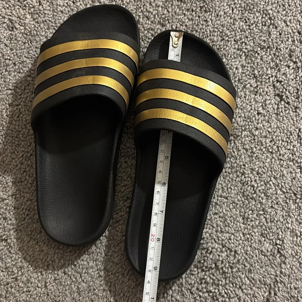 adidas Black Slide Sandals with Metallic Gold Stripes